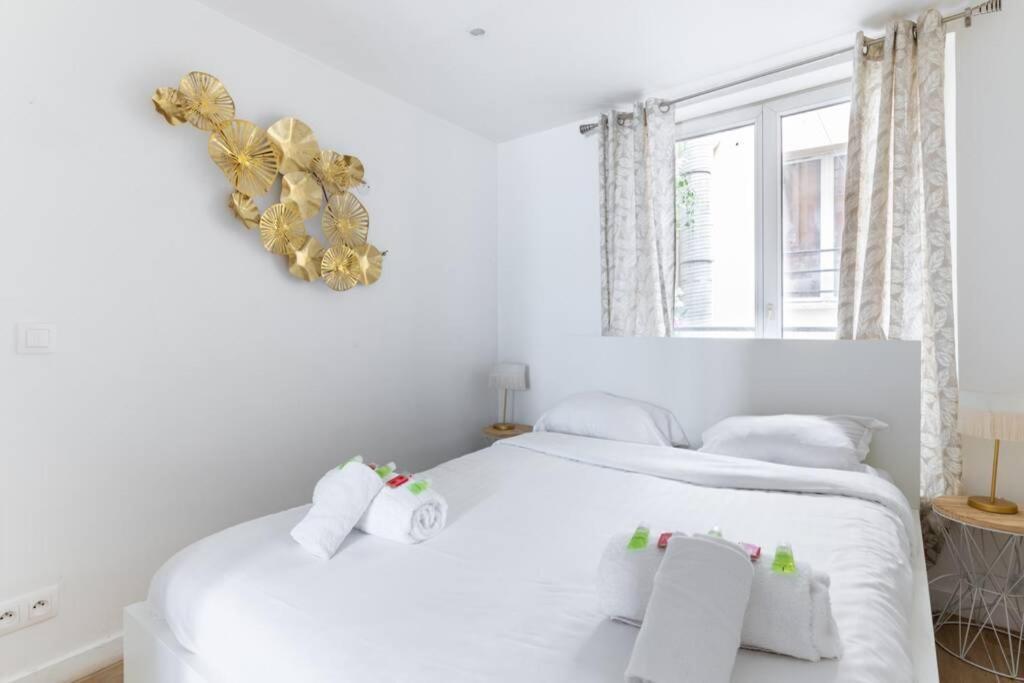 Appartement Grands Boulevards - 21 - Paris Bagian luar foto